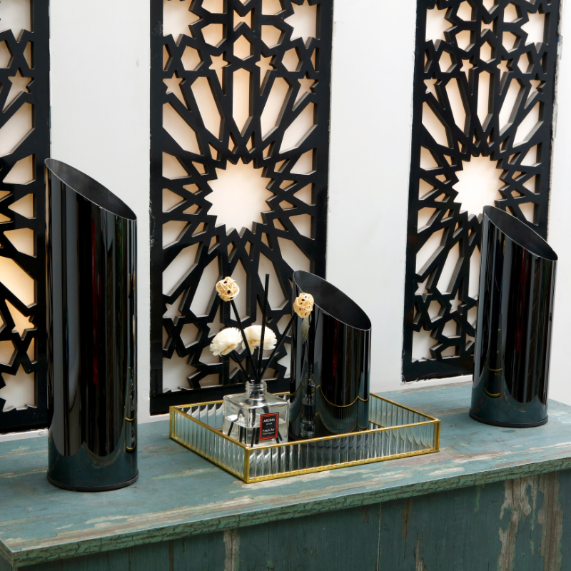 Noir Fluted Vase Trio: set of three black fluted stainless steel table vases