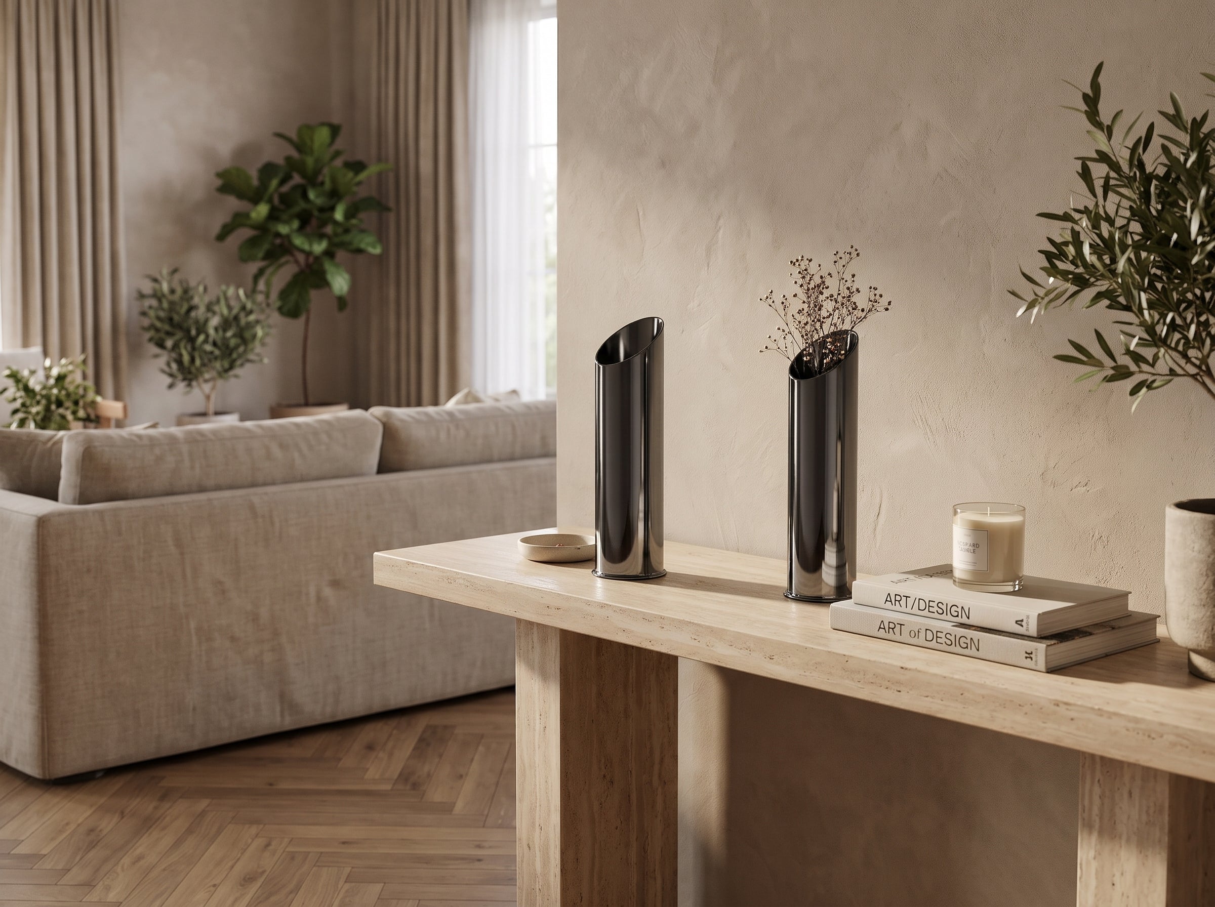 Noir Slant Vase in mirror black on a travertine console table in a neutral living room