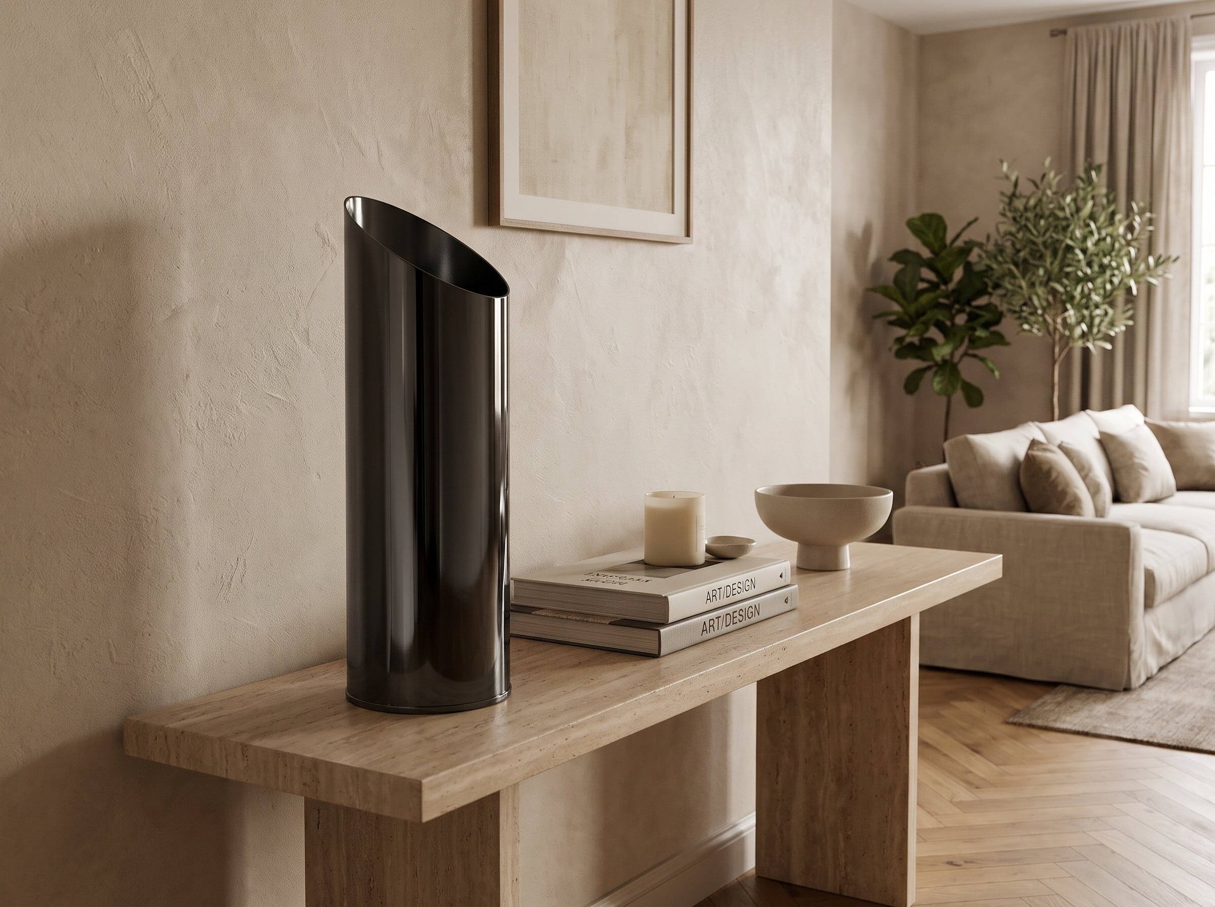 Large Noir Slant Vase on a console table with books and a ceramic bowl